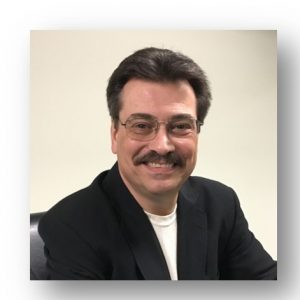 Headshot of Dr. Mark Quarto